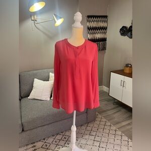 Beautiful blouse with tab sleeves.